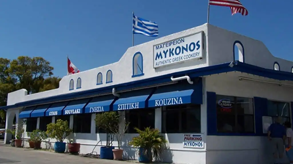 exterior of a restaurant with a white and blue paint job