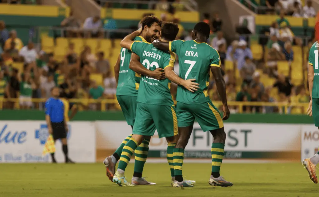 Soccer players celebrating