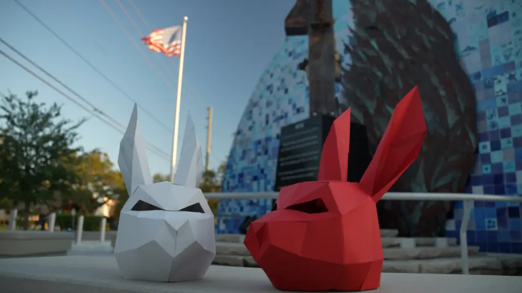 A pair of rabbit heads on a sidewalk