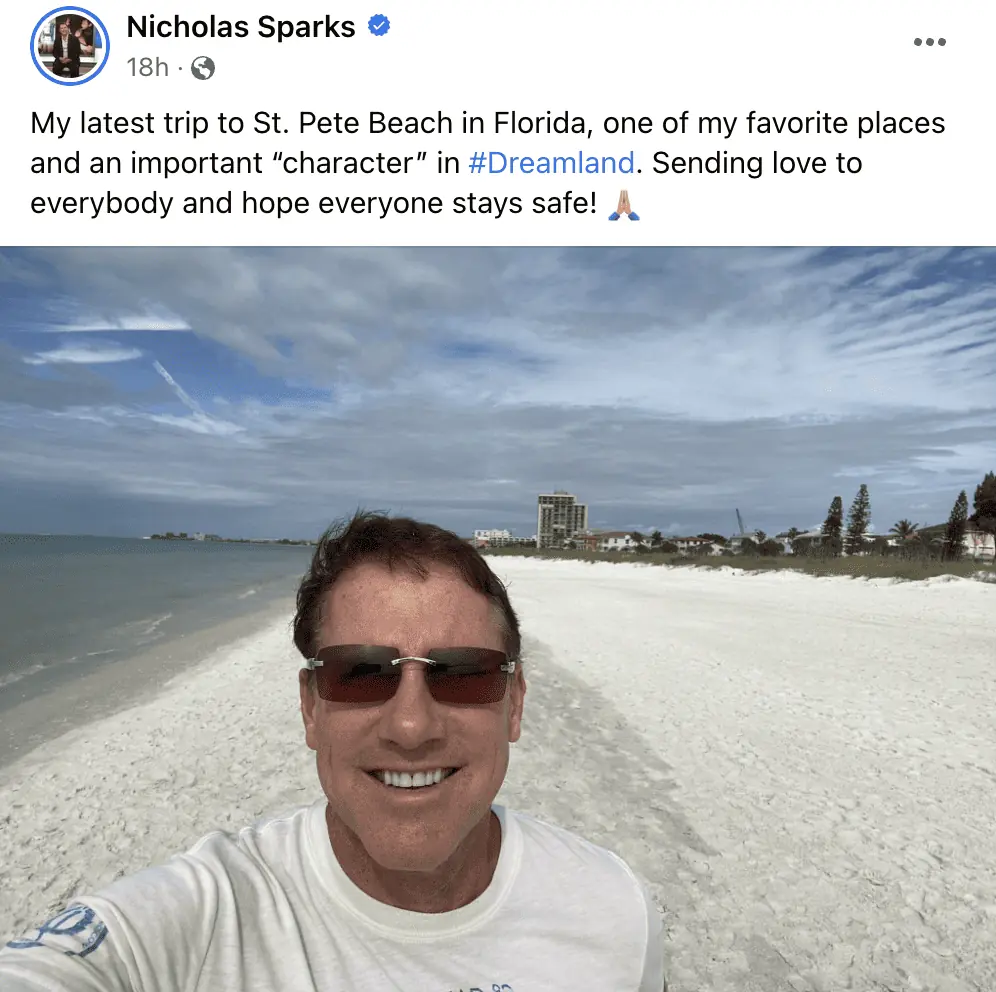 Nicholas Sparks standing on a beach