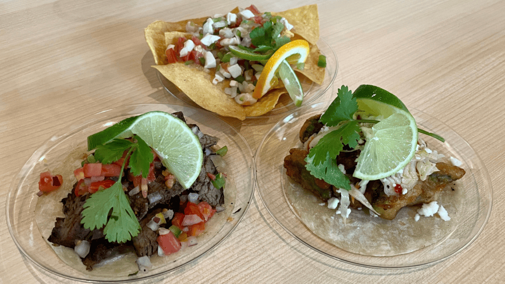 Plates of tacos and nachos