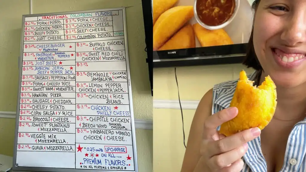 empanada flavor list on a dry erase whiteboard and Ysanne smiling with an empanada