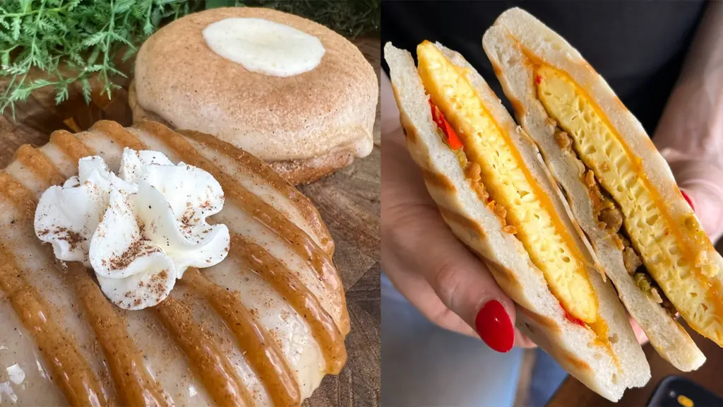 a breakfast sandwich and two donut on a plate