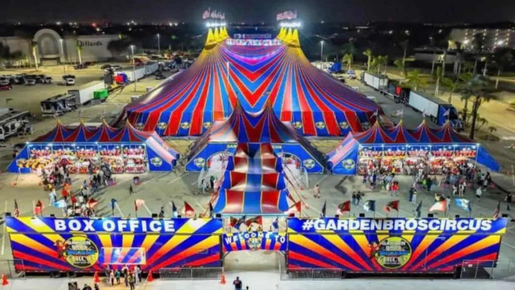 A circus tent in a parking lot