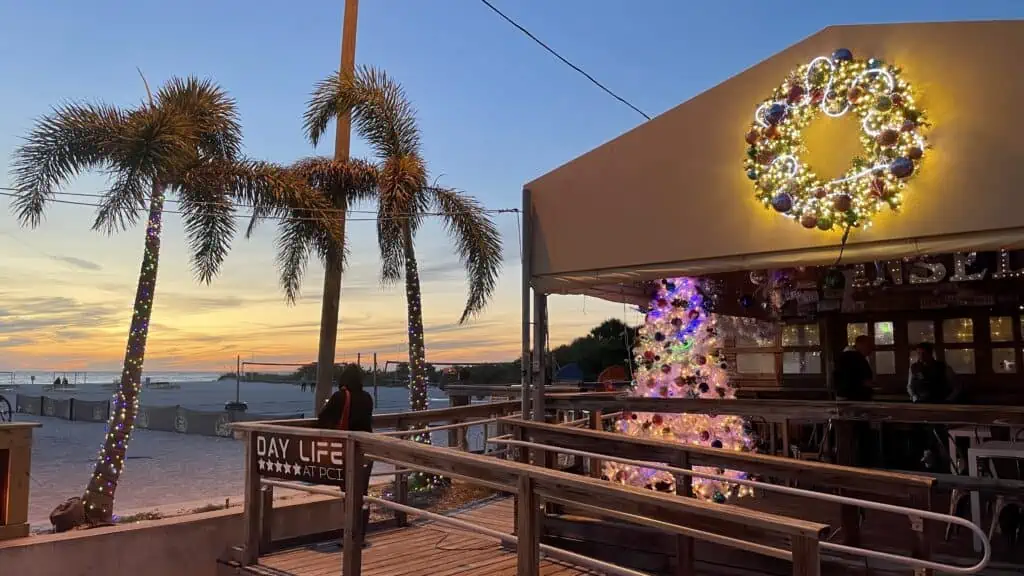 A beach bar lit up for Christmas