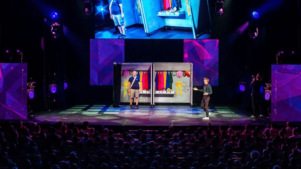 People on a stage for a magic show