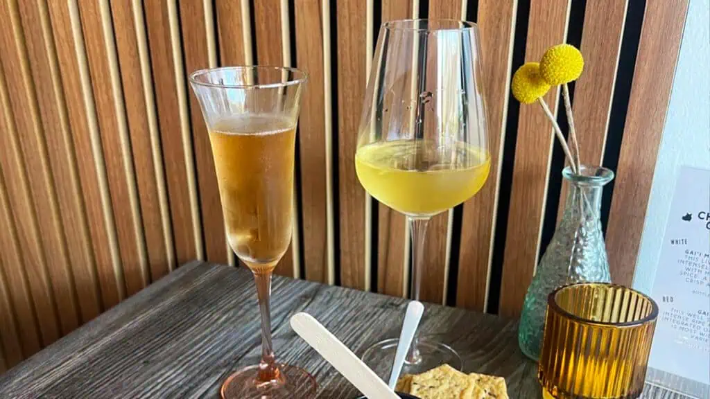 a glass of bubbles and white wine