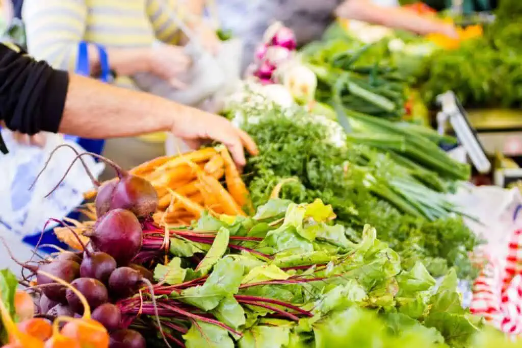 table with fresh vegetables on it