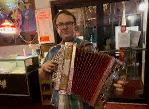 a person playing an accordion