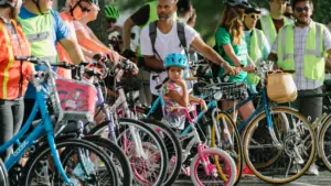 People next to bicycles