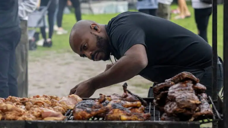 A pitmaster grilling