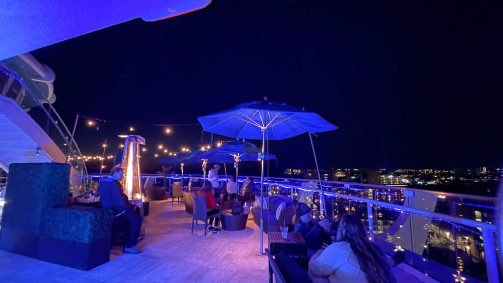 the rooftop bar of the Bellwether Beach Resort at night