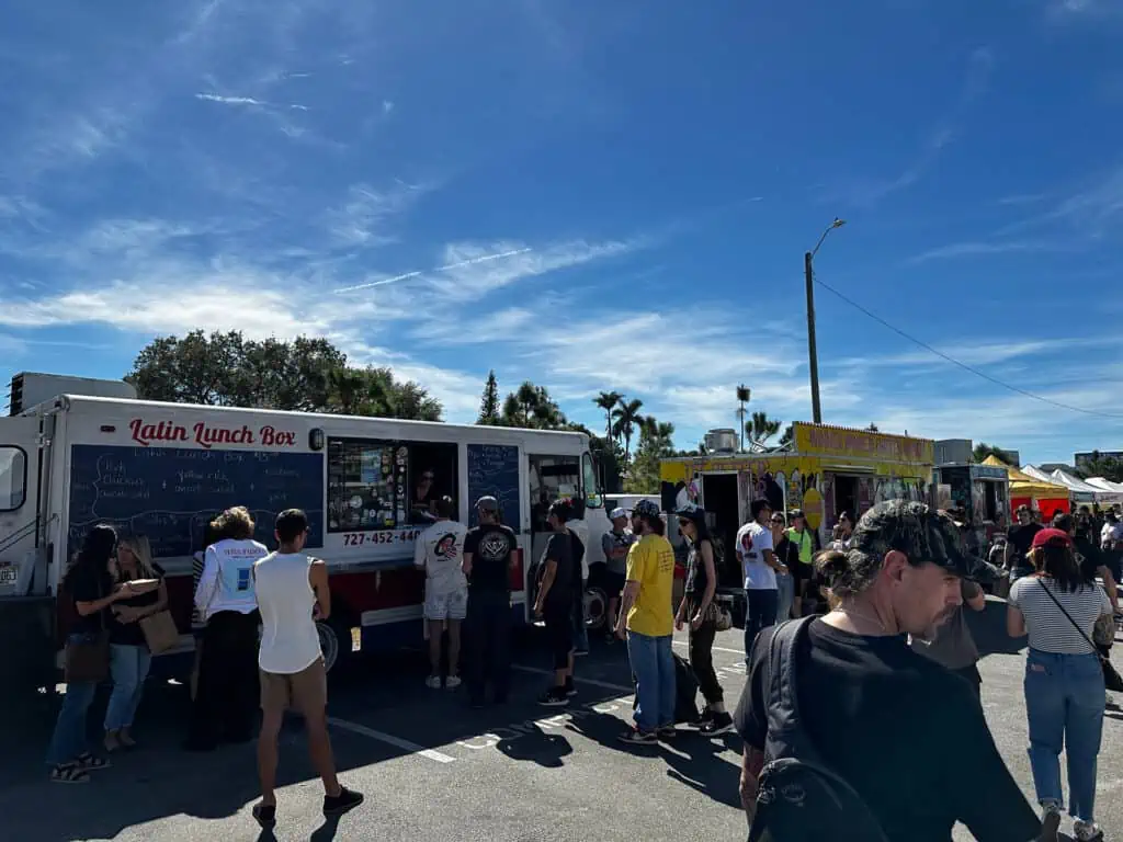 Food trucks lined up at a local market