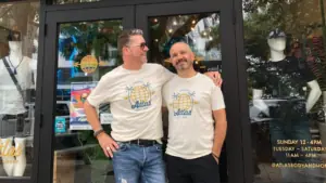 Men standing outside a store