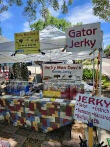 Exotic jerky vendor with patrons