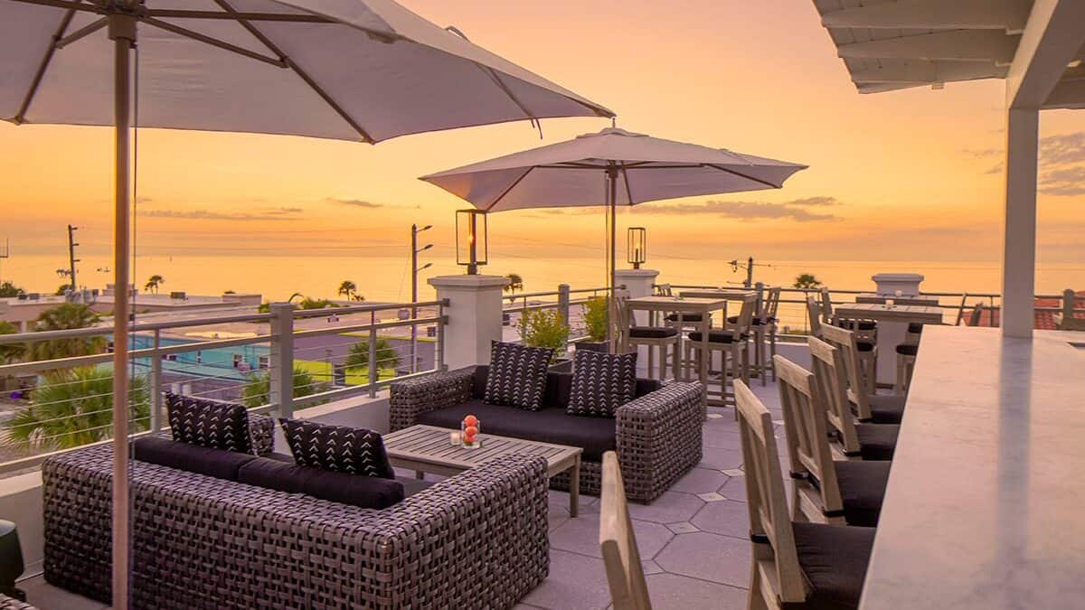 Take in the golden skies at sunset from one of the lounges at the Berkeley Beach Club.