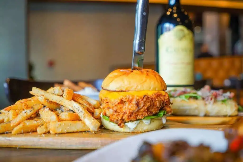 Taverna Costale's chicken sandwich with seasoned fries is the perfect midday meal.