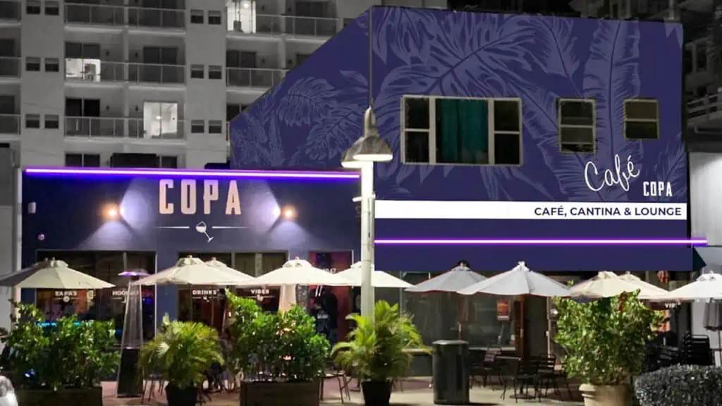 exterior of a new restaurant and cafe with purple lights over the awning.