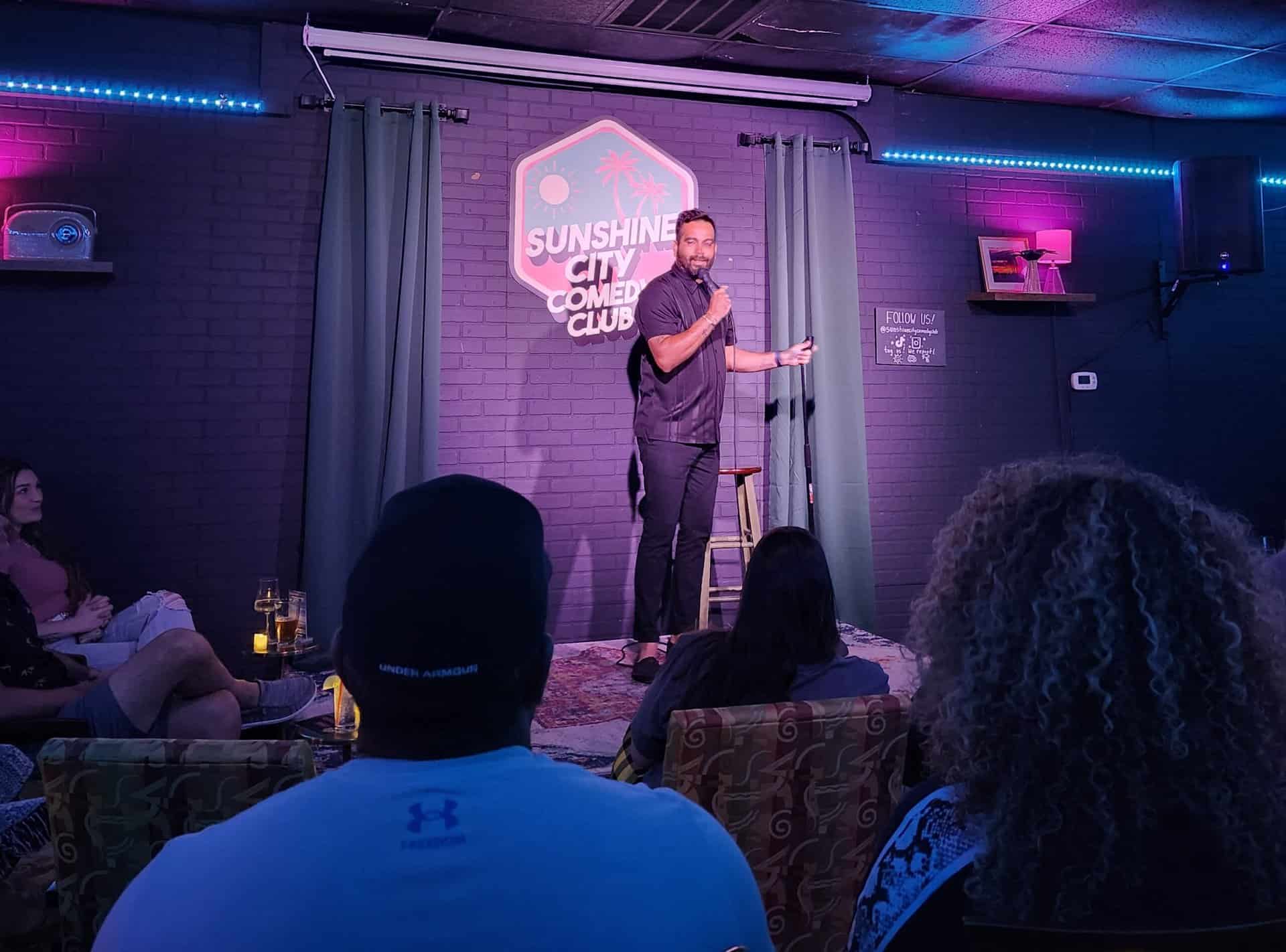 Kenny Garcia on stage at the Sunshine City Comedy Club