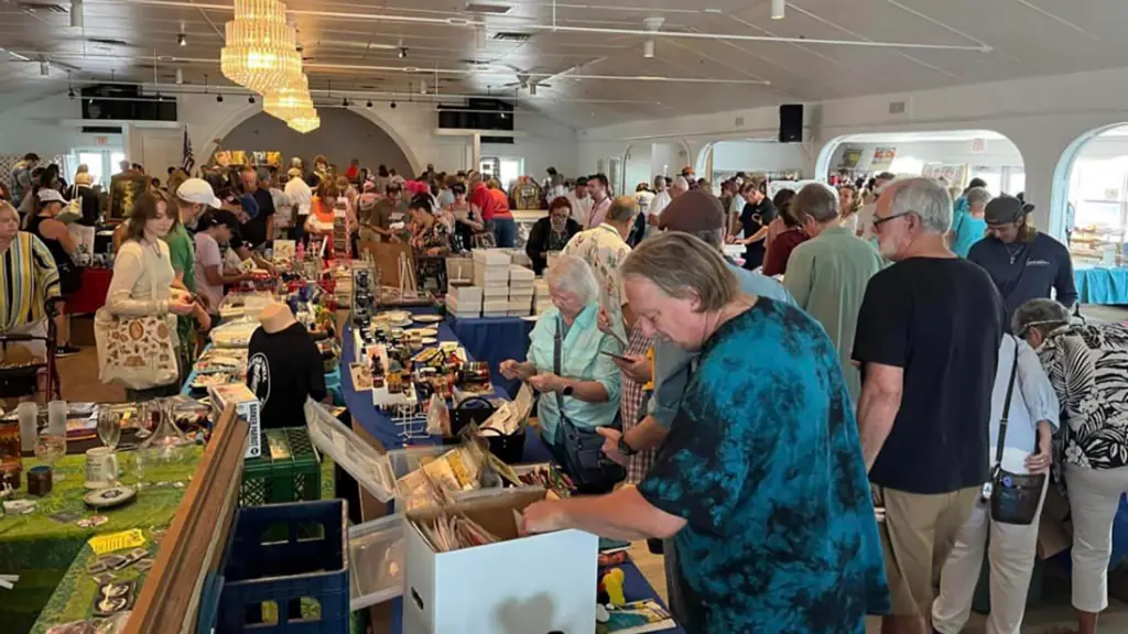 a group of people shopping at an event