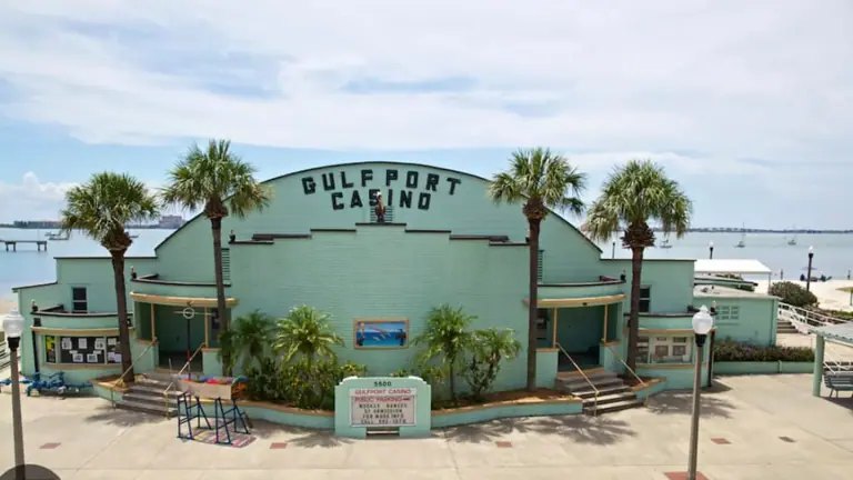 exterior of an events venue. It has a light blue paint job and the words "Gulfport Casino" appear at the top