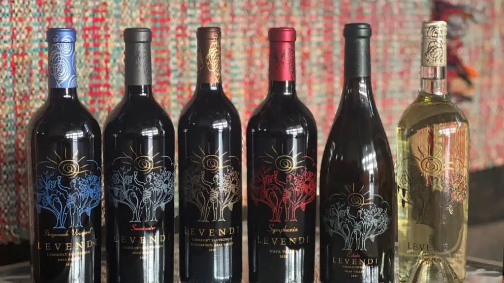 multiple bottles of wine on a table 