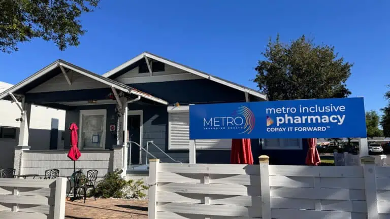 Front facade bungalow of Metro Pharmacy with signage