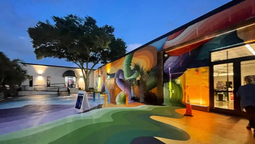 exterior of a building with colorful mural