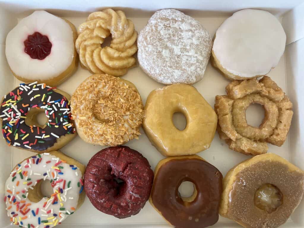 aerial of donuts with different frostings on top