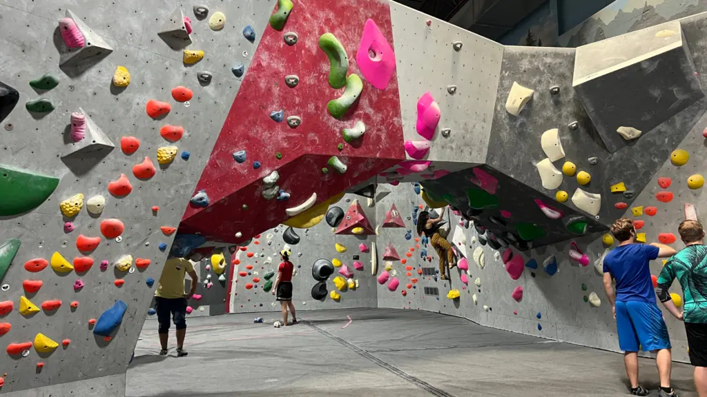 People rock climbing