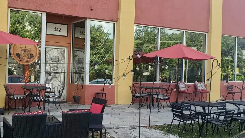 Exterior of a wine bar with outdoor seating