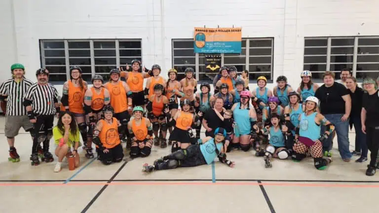 Roller Derby participants pose after a bout