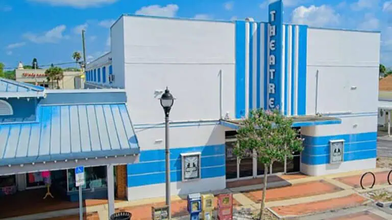 blue and white theatre with blue sky and clouds