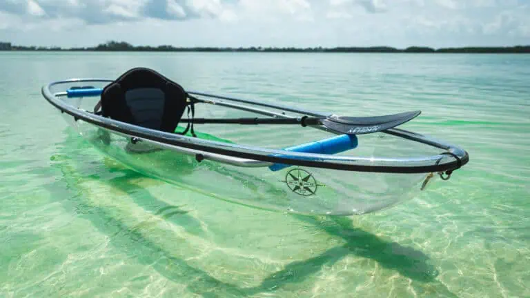 a clear kayak in crystal clear water