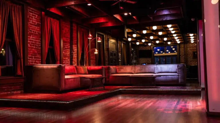 lounge seating next to a dance floor at a club