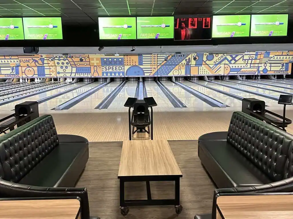 Empty bowling alley with booth seating