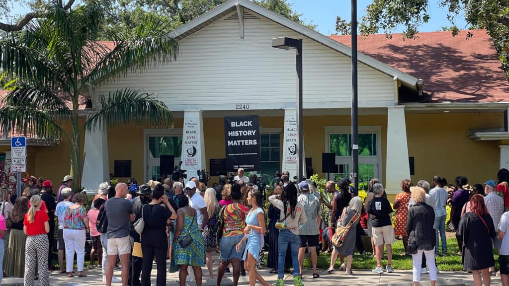 exterior of a museum with people standing outside