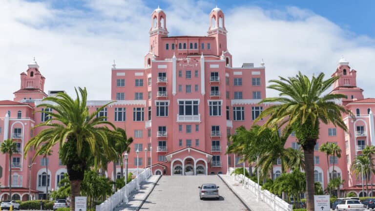 exterior of a large pink hotel