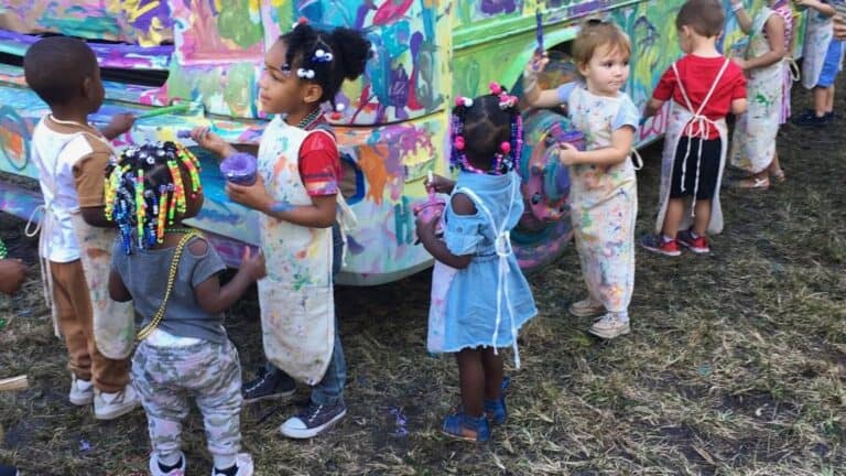 kids painting bus