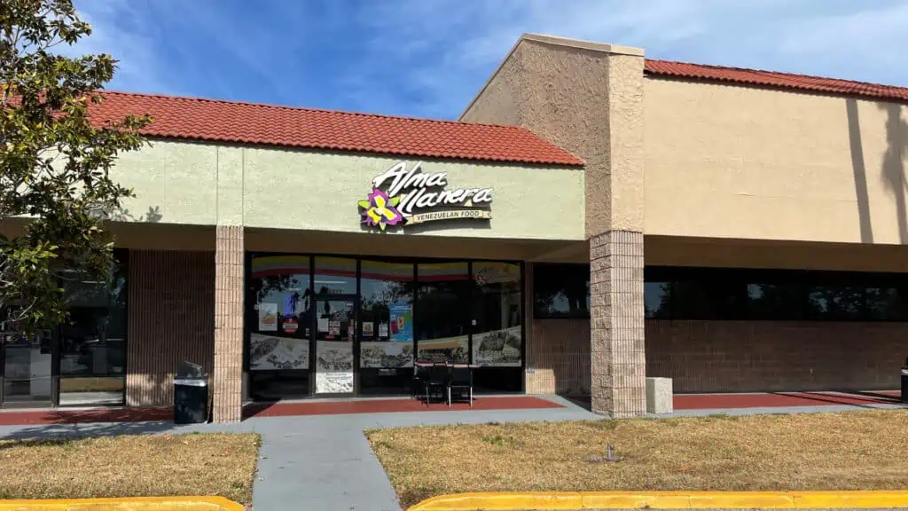 the exterior of alma llanera venezuelan restaurant on a sunny day