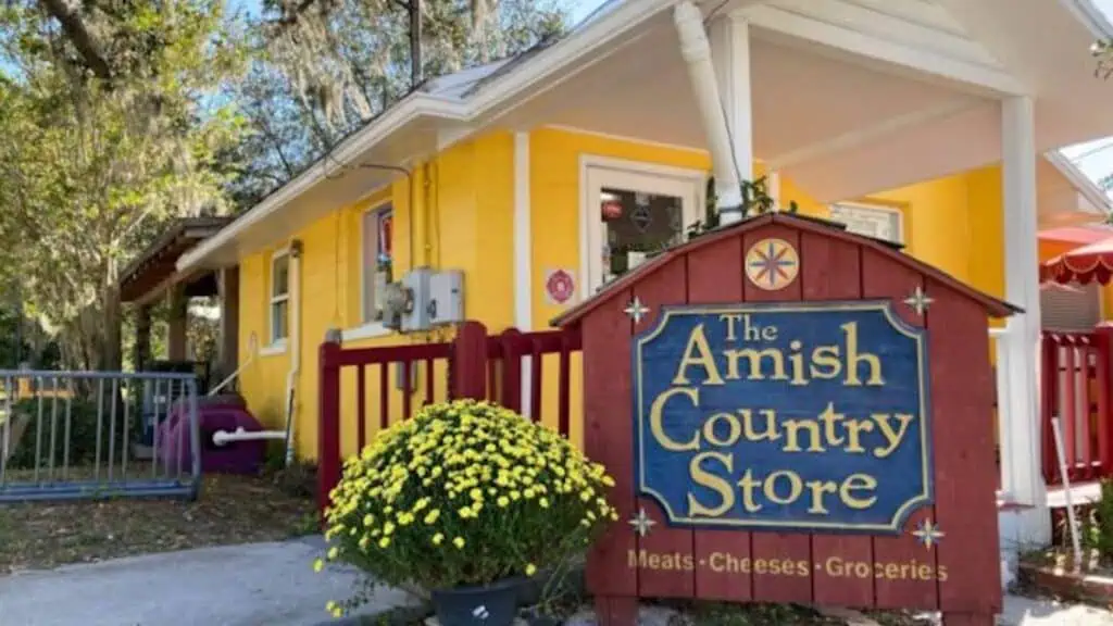 exterior of a country store with a yellow paint job