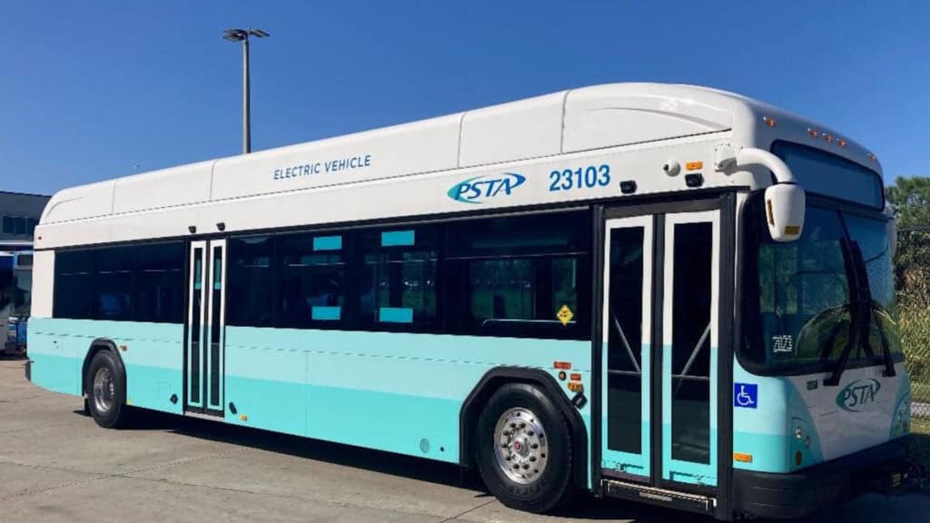 a blue and white electric bus