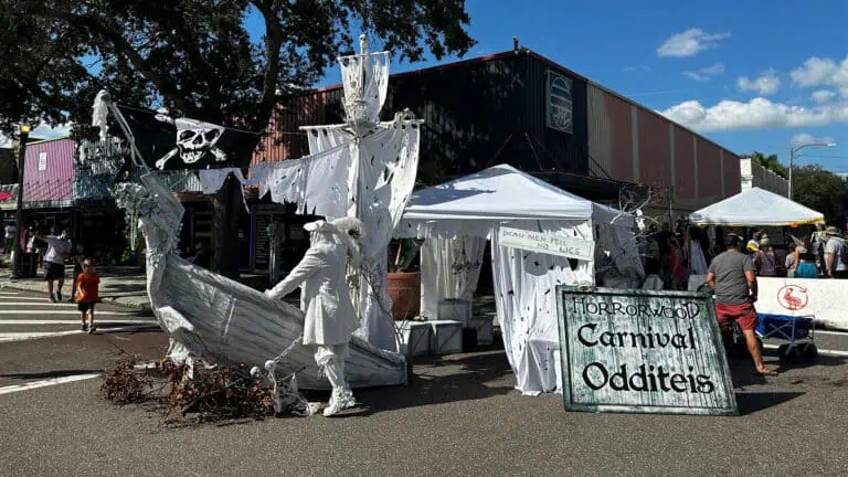 a large open air halloween event with a ghost ship set up on the street