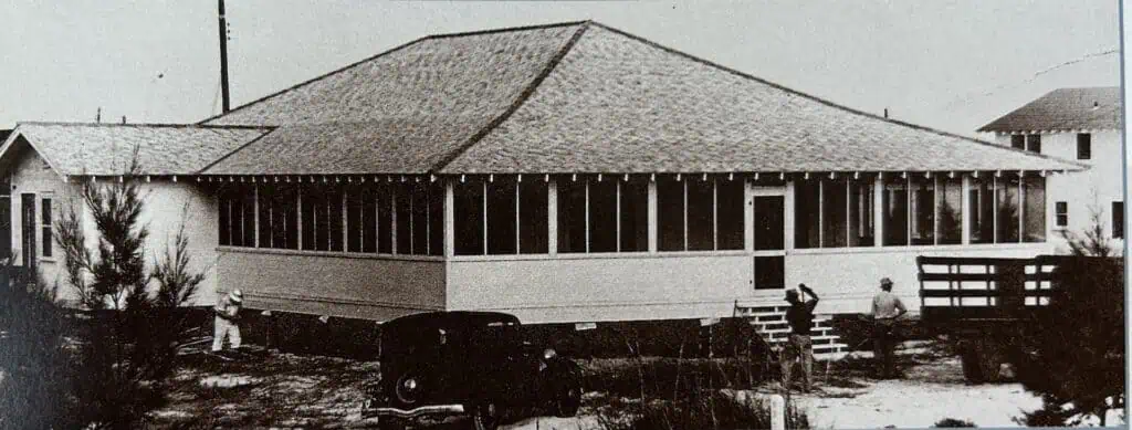 Black and white photo of a clubhouse on Sunset Beach. 