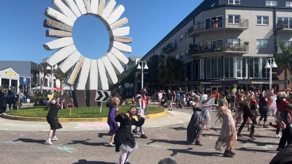 people dance to thriller during a big Halloween event