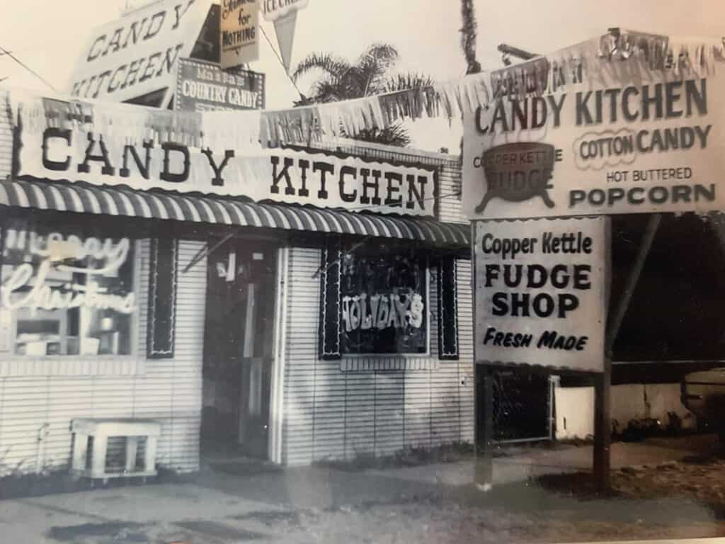 A black and white candy shop photograph taken in the 1950s.