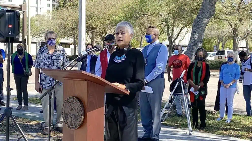 a person speaks at a podium during an event