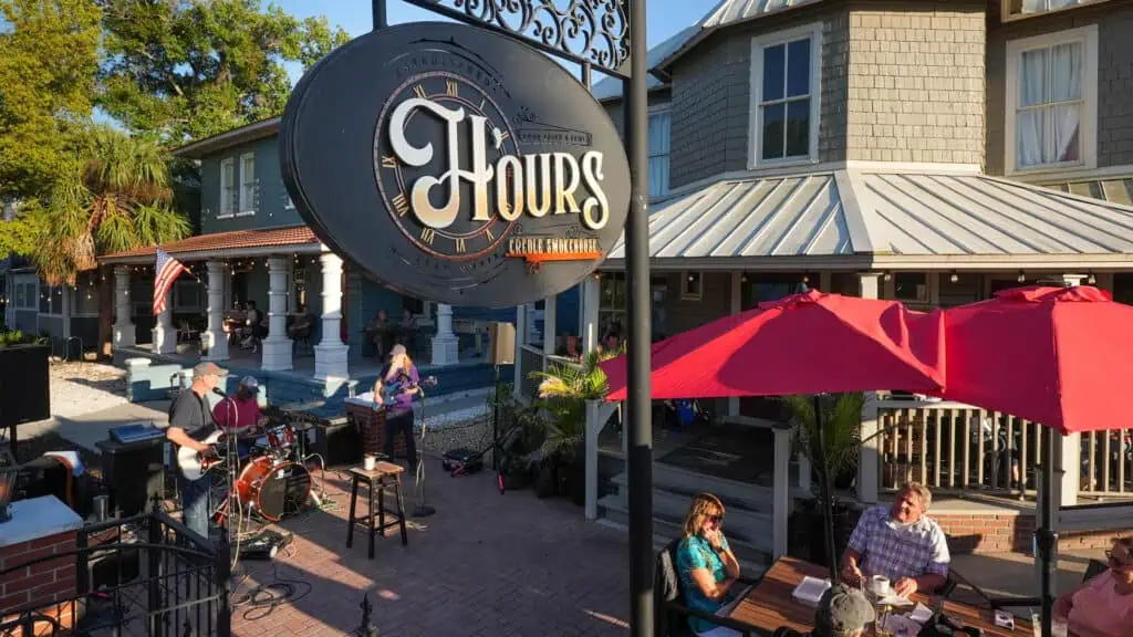 exterior of a BBQ restaurant with an outdoor patio