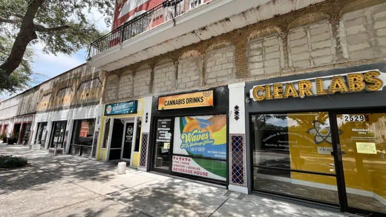 storefronts with colorful signage on the front of their businesses