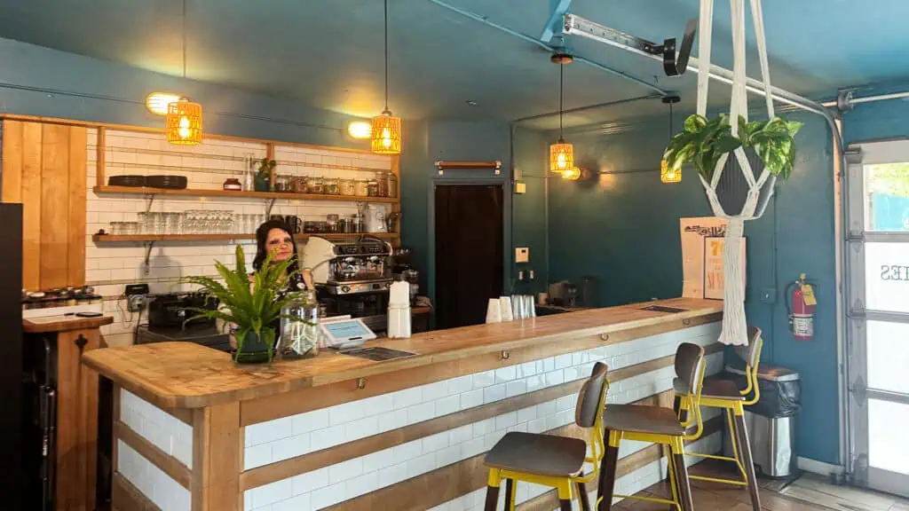 blue walls and a white and wooden countertop make the interior of rabbit rabbit a new cafe